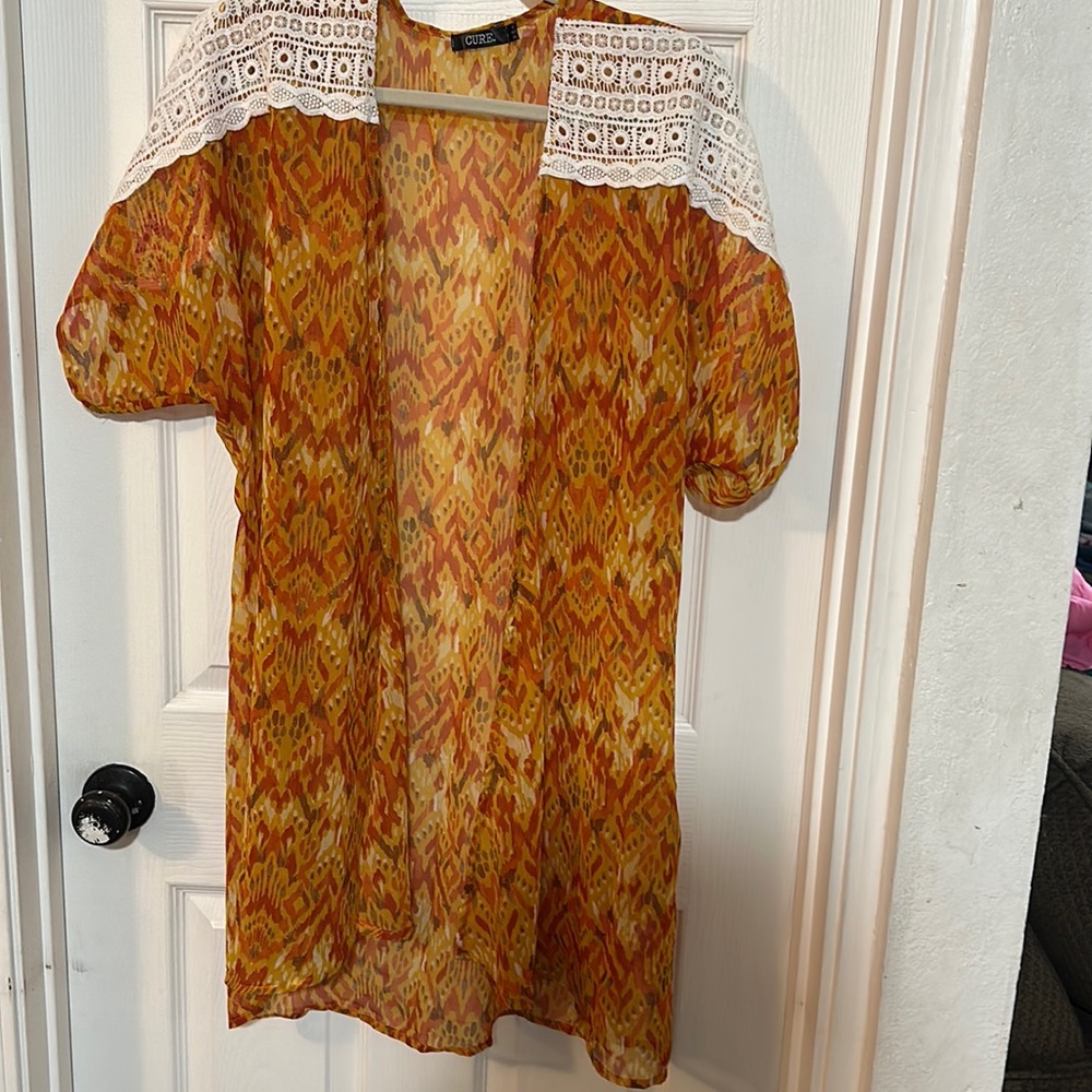 Cure brand cover up size M